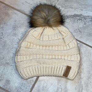 Cream beanie with Puff Ball